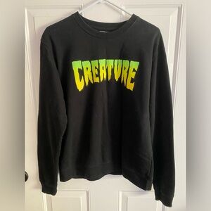 EUC Creature Crewneck size Small
